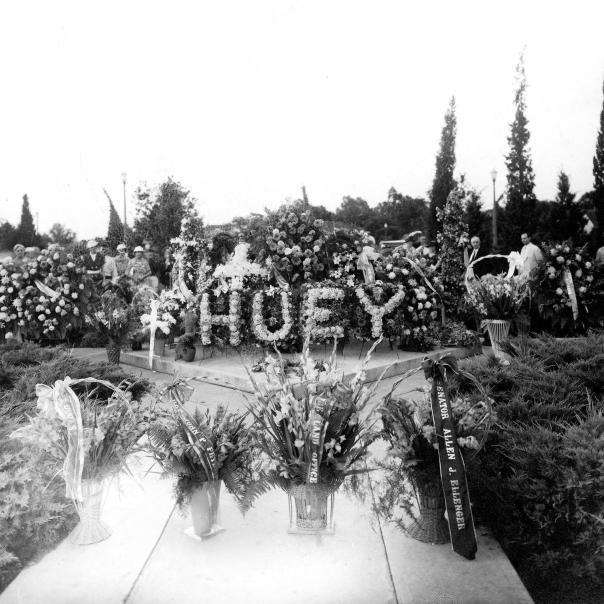 Flowers at Long's gravesite on the anniversary of his death, before his statue was erected