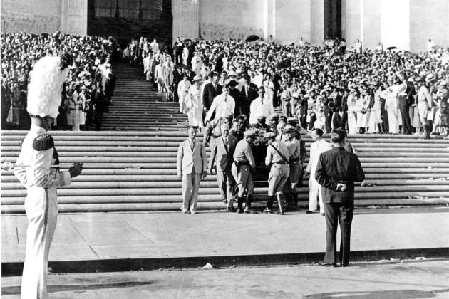 Long's casket is carried down the steps of the Louisiana State Capitol. The Rev. Gerald Smith stands ready to lead the procession to Long's interment on the grounds of the Capitol.