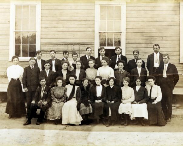 Huey Long (top row, fourth from left) and his classmates pose for a group photograph outside their school in Winnfield, La.