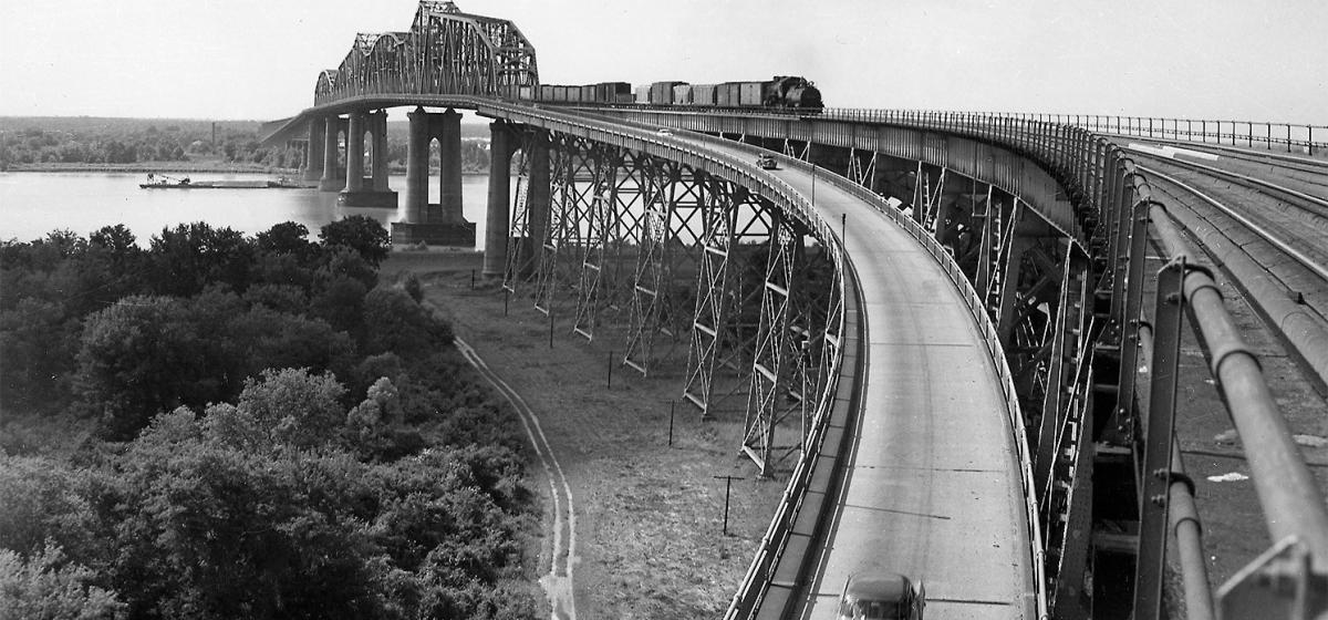 The massive Mississippi River bridge carrying rail and auto traffic. The bridge was named after Huey P. Long following his assassination.