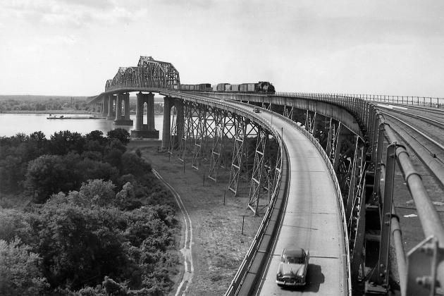 The massive Mississippi River bridge carrying rail and auto traffic. The bridge was named after Huey P. Long following his assassination.