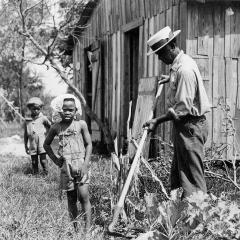 Box factory worker living in poverty as a result of low wages (1938). The average wage was about one dollar a day for the average Louisiana factory worker.