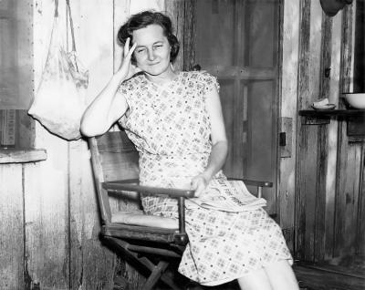 "This is Mrs. Berry Hall. For 10 years she worked at the factory in Roseland and made 10 cents an hour. Now she is married, unable to work, and supported by a husband who makes only a few cents more than she did."